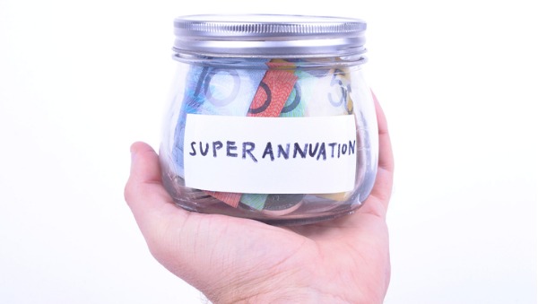 hand holding jar of money with superannuation sticker
